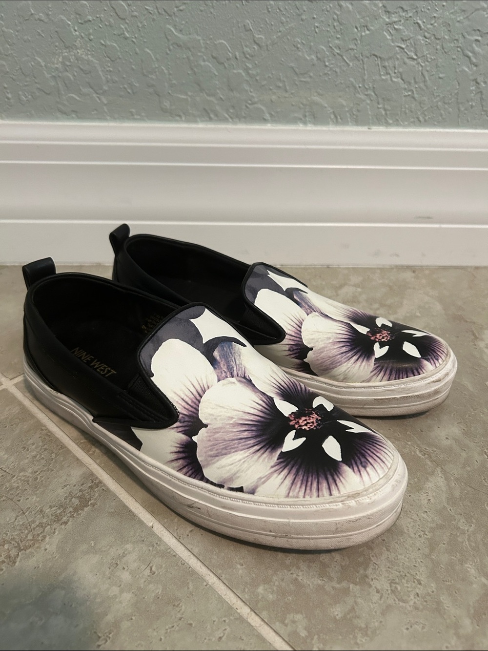 Nine West Women's Floral Slip-On Sneakers in Black and White